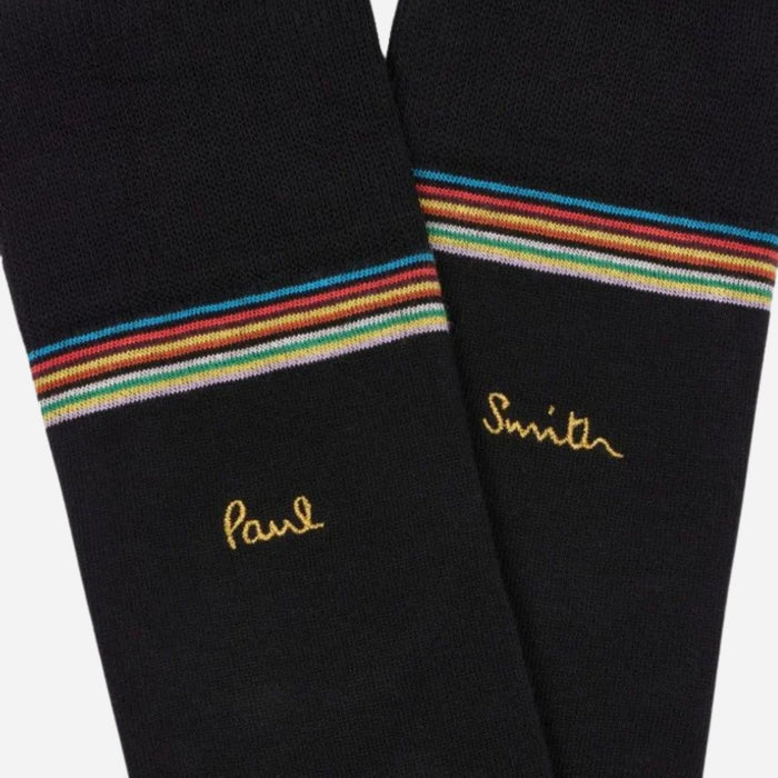 Close up of the black pair from the Paul Smith 3-Pack Signature Stripe Mid-Calf Socks with Gold Logo.