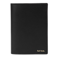 Paul Smith's Black Leather Signature Stripe Passport Holder has the signature in gold foiling on the front.