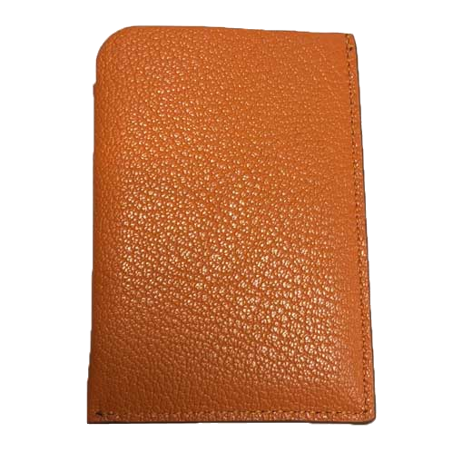 Paul Smith orange leather card holder comes with a textured material.