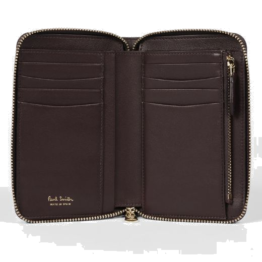 The inside of this Paul Smith 'Dusky Swirl' Leather Zip-Around Medium Purse has a burgundy leather interior with polished gold hardware.