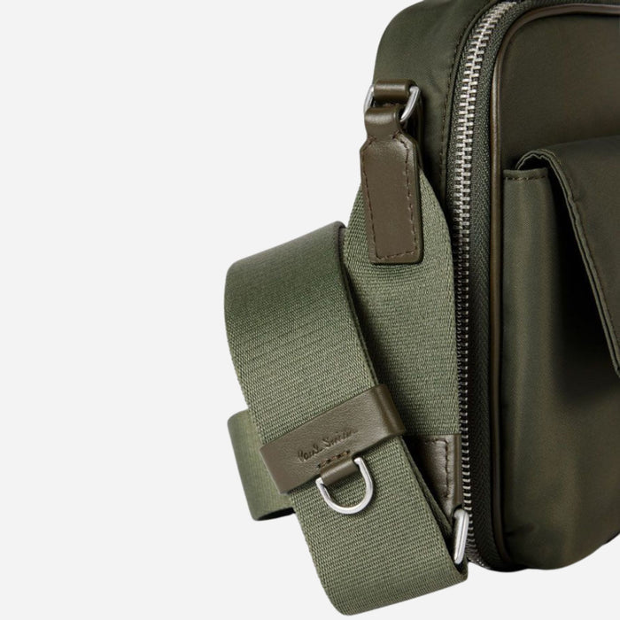 Close up of the Paul Smith Green Recycled Nylon Small Flight Bag with Signature Stripe Trims.