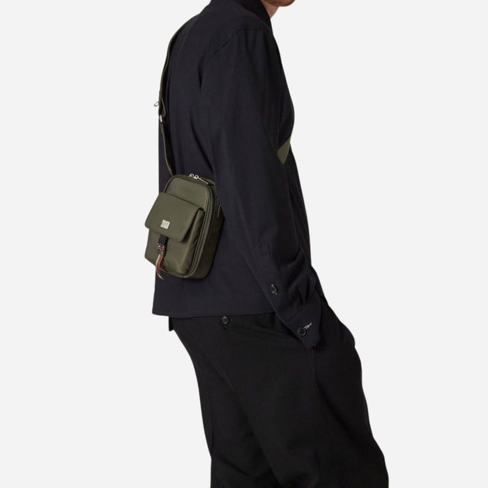 The Paul Smith Green Recycled Nylon Small Flight Bag with Signature Stripe Trims by Paul Smith.