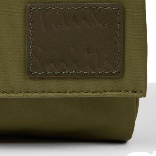 This Khaki Nylon & Leather Trim Wash Bag has a flap closure that opens up and can be hung onto hooks in the bathroom for easy access.