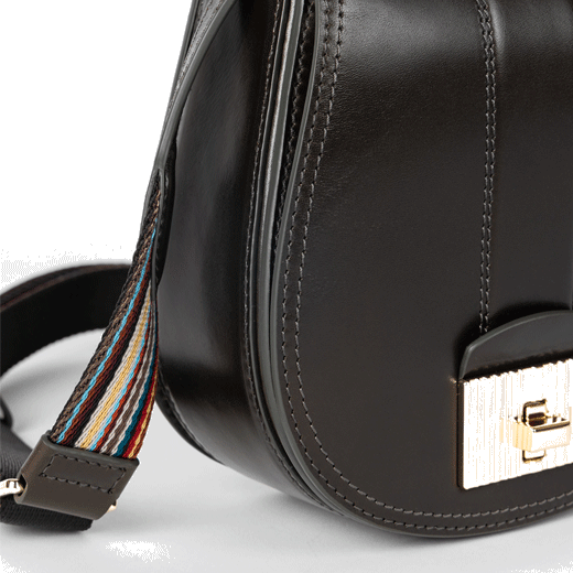 This Paul Smith Leather Tear Drop Cross Body Bag has gold hardware and the signature stripe detailing on the strap.