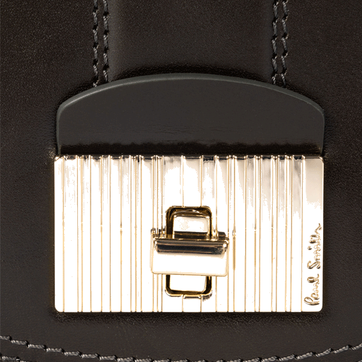 This Leather Tear Drop Cross Body Bag by Paul Smith has a front flap closure with polished gold hardware.