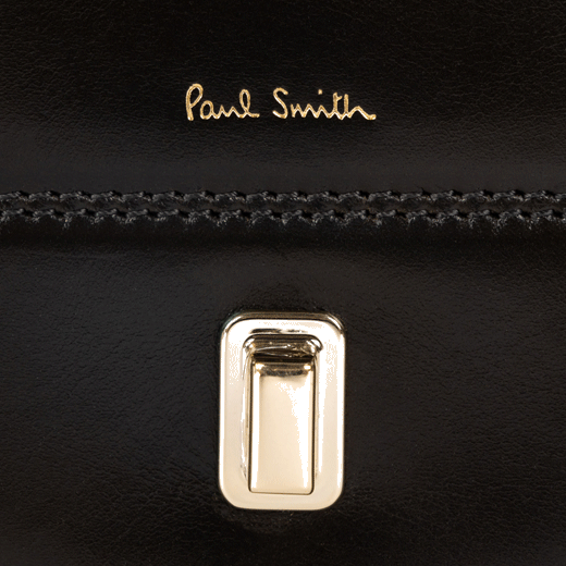 This Paul Smith Leather Tear Drop Cross Body Bag has the brand name in gold foil embossing to match.