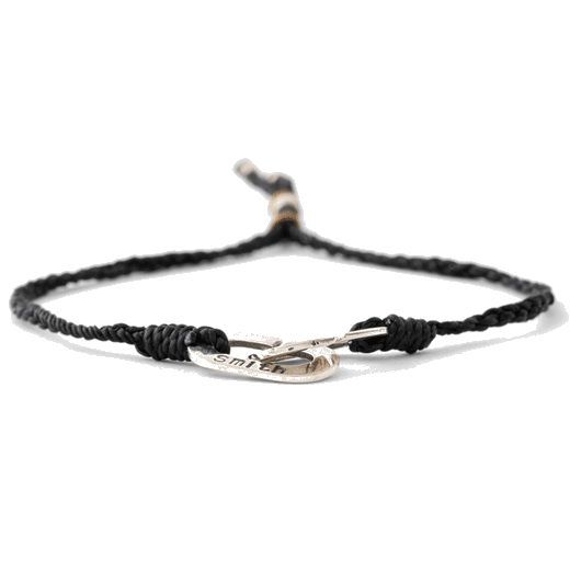 This Men's Black Oval Link Bracelet comes with a polyester cord and engraved Paul Smith silver charm and bead.