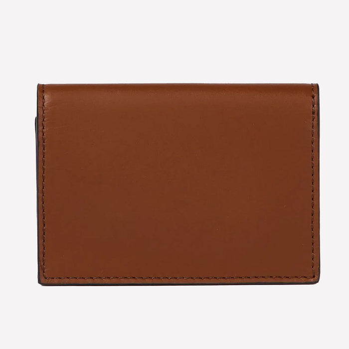 This card holder from Paul Smith comes with a smooth brown leather on the back.