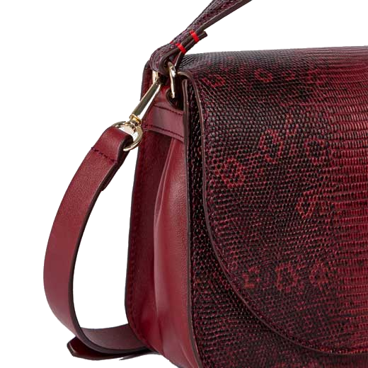 This Paul Smith Women's Mock Lizard Burgundy Clutch Saddle Bag features a zip on the back.