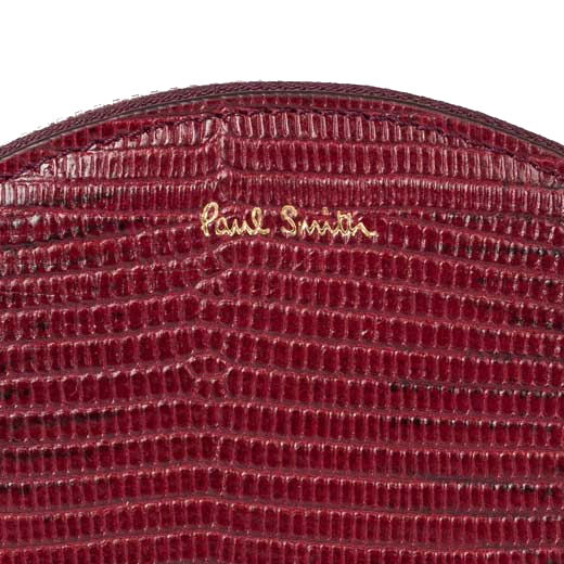 This Paul Smith Women's Mock Lizard Burgundy Moon Purse will be presented inside a black gift box.