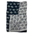 This Paul Smith scarf is made from a silk material in a floral black and white pattern.