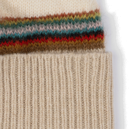 This Women's 'Signature Stripe' Wool Beanie Hat by Paul Smith has the signature stripe detailing which divides the cream and oatmeal colours.