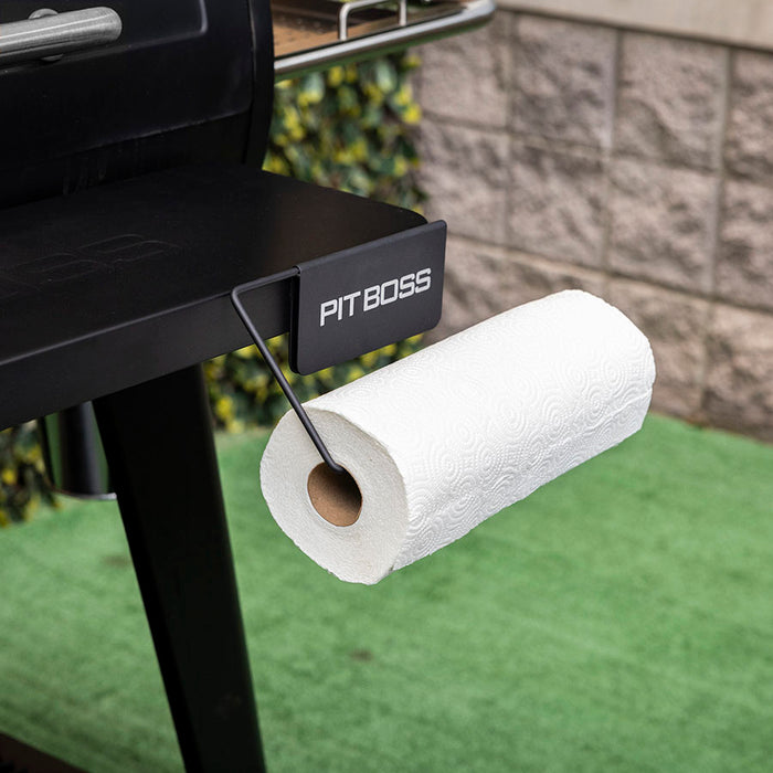 Pit Boss Magnetic Paper Towel Holder for BBQ Grills and Smoker Upgrade Attachment, magnetized to front of grill with paper towel roll