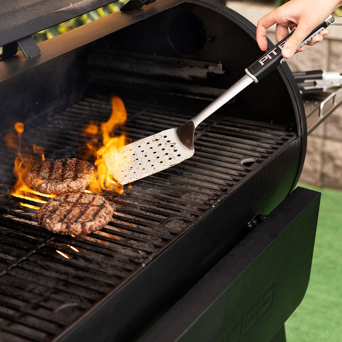 Pit Boss Grills BBQ Spatula flipping burgers on hot grill