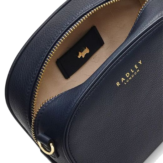 This Arden Crescent Ink Leather Cross Body Bag by Radley has a small main compartment with the Radley jacquard lining.