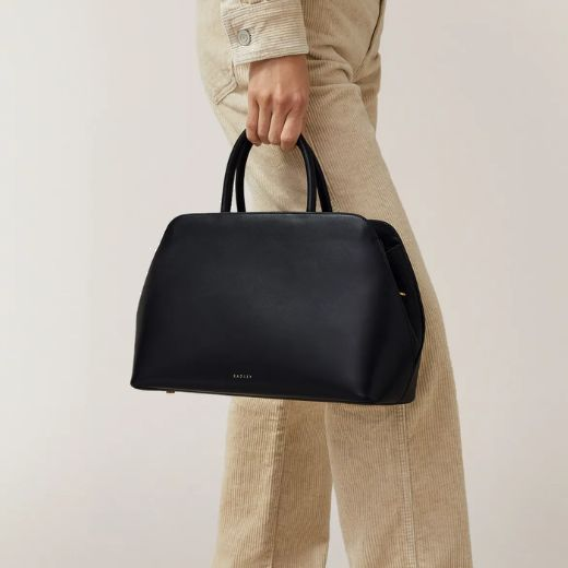 This Liverpool Street 3.0 Black Leather Medium Grab Bag by Radley is quite spacious and has three main compartments.