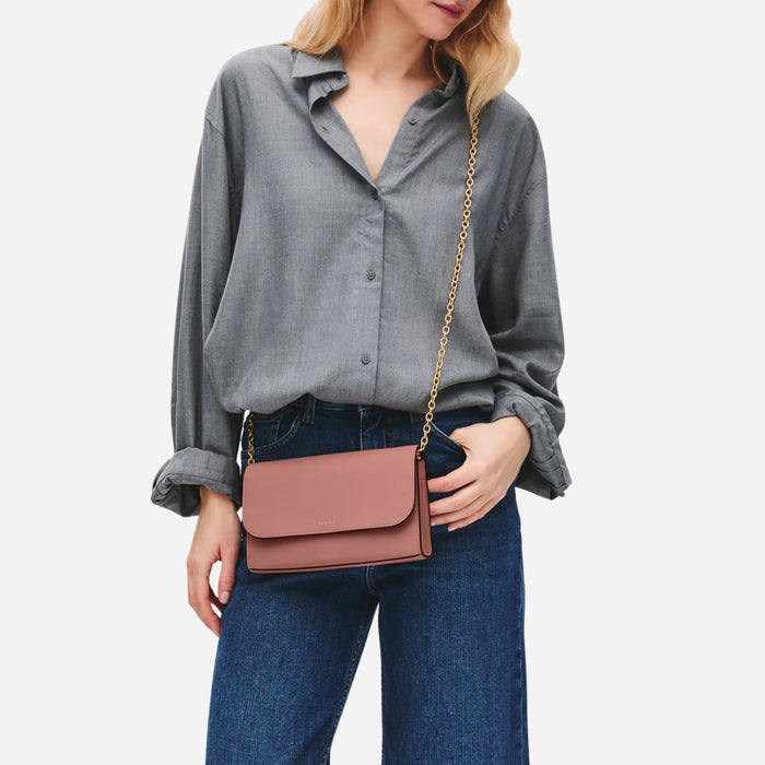 The Radley Lynton Road Carnation Leather Wallet On a Chain worn cross body.
