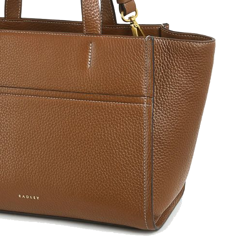 This Oak Street Saddle Leather Medium Zip-Top Grab Bag by Radley features polished gold trims and the brand name in foil embossing on the front to match.