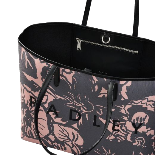 The main compartment of the Southwell Gardens Black Floral Large Open Top Tote Bag fastens with a silver clip, and also contains a hanging zipped pocket.