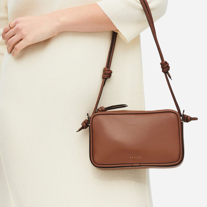 Close up of the Radley The Camden Cognac Leather Small Ziptop Shoulder Bag.