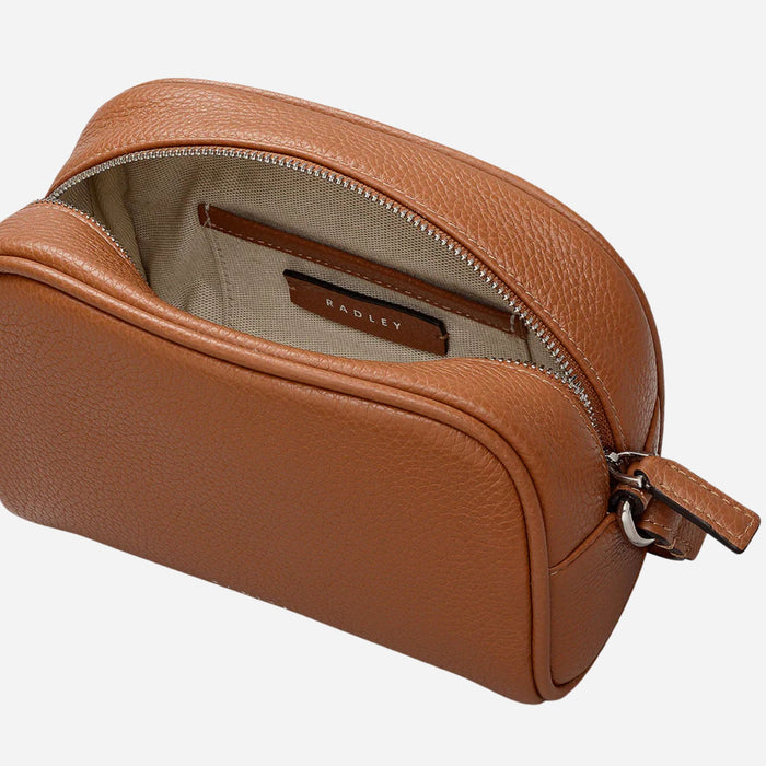 Inside the Radley The Daily Toffee Brown Small Zip Top Cross Body Bag.