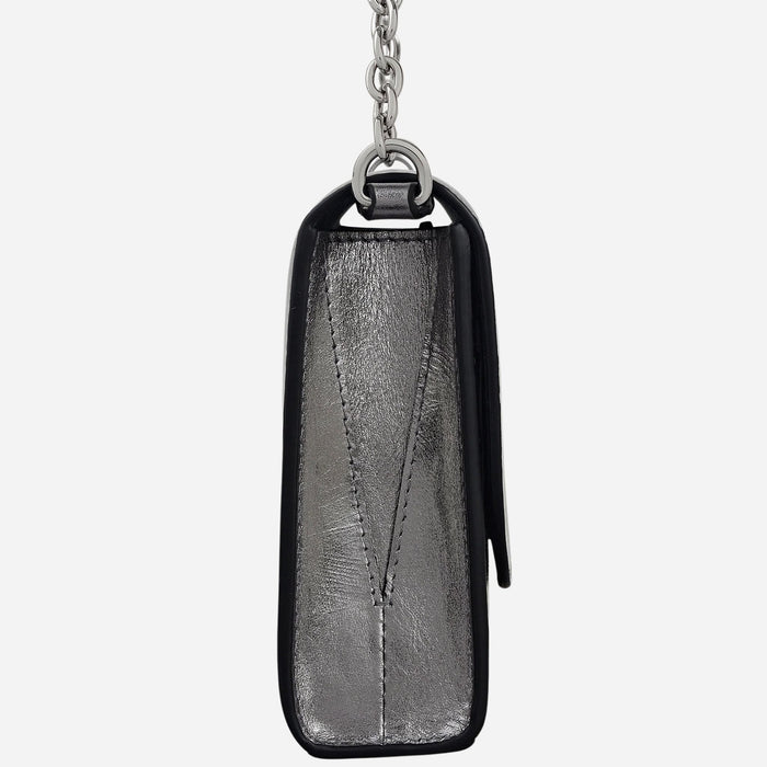 Side view of the The Rathbone Silver Micro Flapover Cross Body Bag.