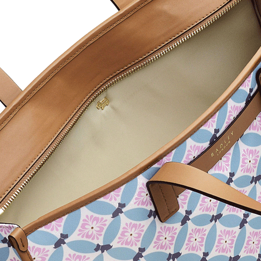 This Willow Walk Large Shoulder Bag in Spring Geo by Radley has a zip-top closure into the main compartment.