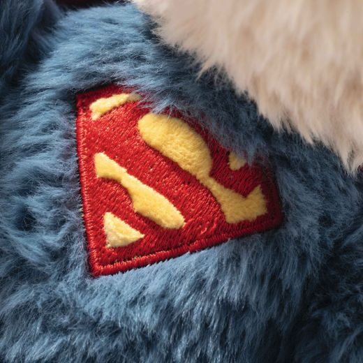 The classic Superman "S" is found on the chest of the 29cm, Superman Teddy Bear.