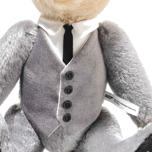 This James Bond Goldfinger 60th Anniversary Musical Teddy by Steiff is wearing the iconic grey suit and is made from mohair and cotton.