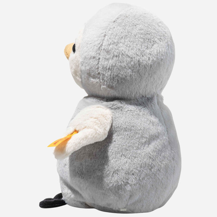 Side view of the Steiff Light at Night 22 cm Lio the Penguin.