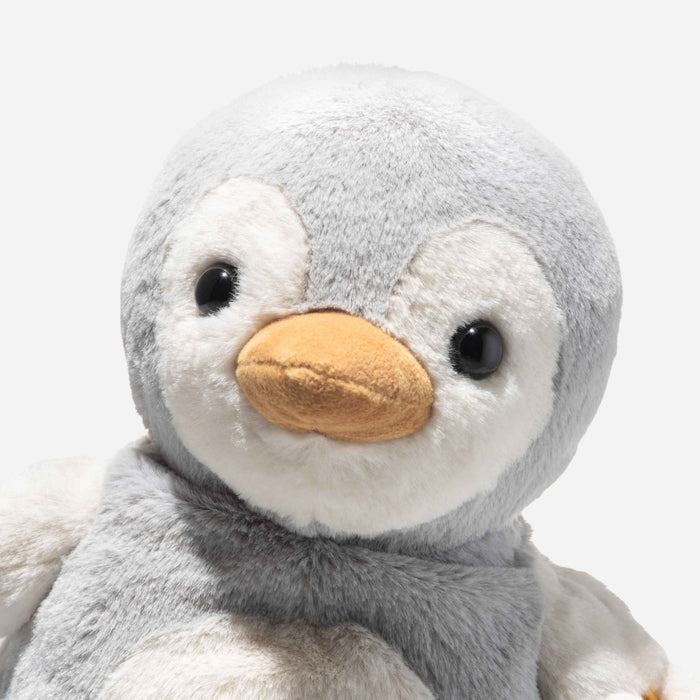 Close up of the Steiff Light at Night 22 cm Lio the Penguin.