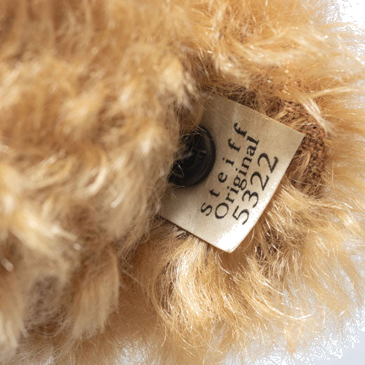 Steiff's Replica 1906 RMS Teddy Bear features an original replica tag in ear.