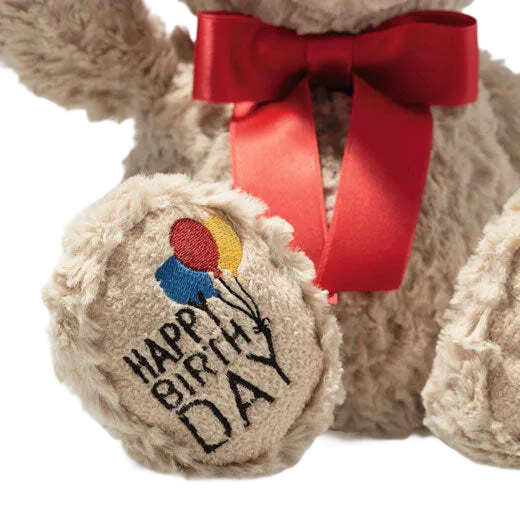 Steiff's Soft Cuddly Friends Jimmy Birthday the Teddy Bear is made from soft plush.