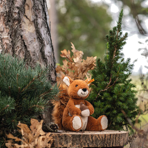 Steiff's Soft Cuddly Friends Phil the Squirrel is crafted out of soft plush material.