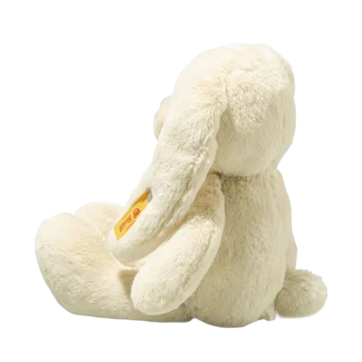 ou'll find the stainless steel button in ear on this Steiff Soft Cuddly Friends Yellow Tilda Rabbit with the yellow label for branding.