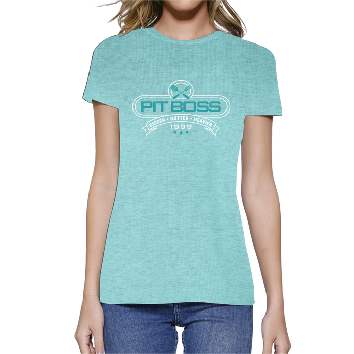 Celeste heather Pit Boss Grills Tools of the Trade women's t-shirt with brand logo and "Bigger, Hotter, Heavier 1999" design.