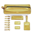TUMI's Accents Kit Gold is great for pairing with your luggage and can be personalised with embossing.