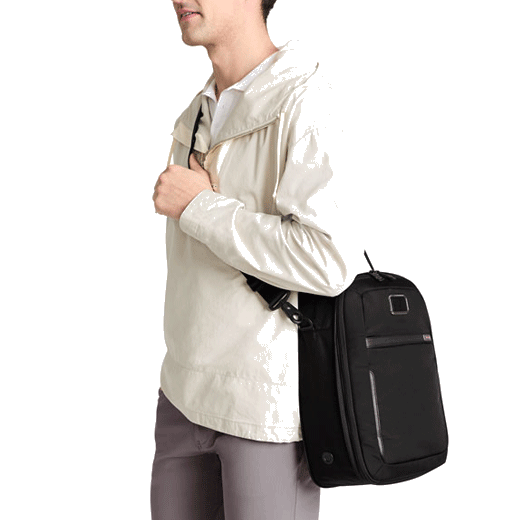 This Alpha 3 Golf Shoe Bag in Black by TUMI has a water-resistant lining inside the main compartment.
