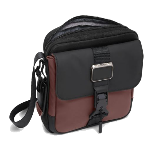 This Alpha Bravo Oxblood Junior Cross Body Bag by TUMI has a zip compartment and a front pocket with a flap closure.