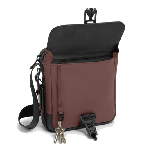 This TUMI Alpha Bravo Oxblood Junior Cross Body Bag has an attached key leash so you can safely keep your keys inside the bag.