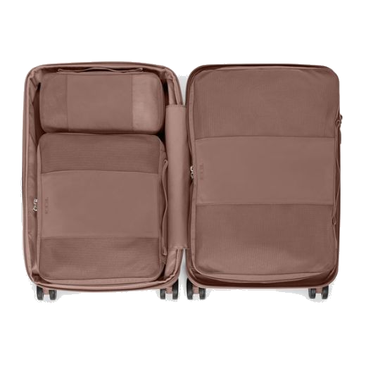 This Medium Packing Cube in Light Mauve by TUMI also comes in a small or large size.