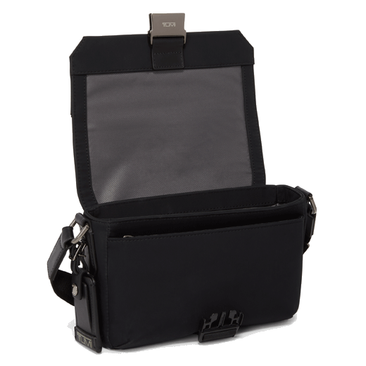 This TUMI Parson Crossbody Bag Harrison has a leather luggage tag and TUMI engraving on the clasp.