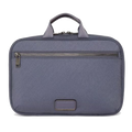 This TUMI Voyageur Blue Shimmer Madeline Cosmetic Case is made out of nylon with leather trims.