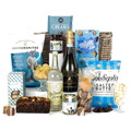 The Indulgence Hamper by Wheelers luxury hampers comes with sweet and savoury snacks.
