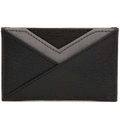 This WOLF Black Howard 7CC Card Holder features a pebble textured finish.