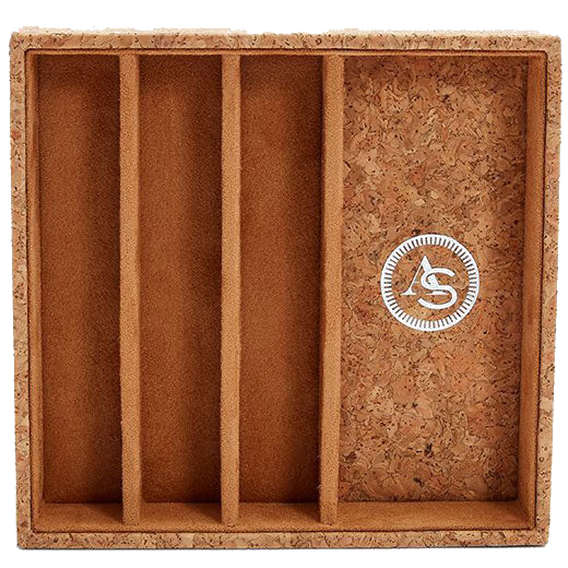 The WOLF 1834 x Analog/Shift 1976 Natural Cork Watch Strap Tray features a foil stamp internally.
