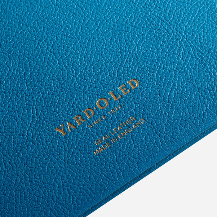 The Yard-O-Led brand name embossed in gold foil on the back of the Yard-O-Led Sampson A5 Luxury Capri Blue Leather Notebook.